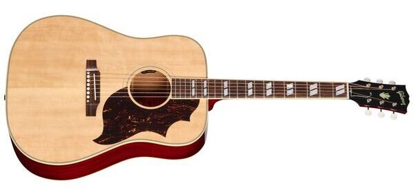 Gibson HiFi DNA: análisis de las 4 acústicas de la Original Collection con sistema Baggs 6 Guitarra acústica Gibson Country Western 60s Original AN en vista frontal, con cuerpo dreadnought de hombros cuadrados, tapa de pícea en acabado Antique Natural, golpeador tortoise de gran tamaño, diapasón de palorrosa con incrustaciones de paralelogramo y aros de caoba visibles en los laterales.